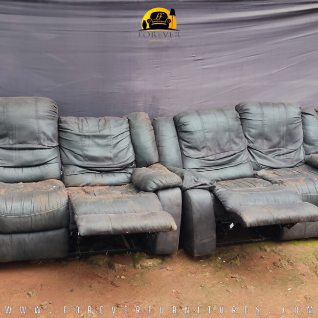 Image of a black recliner couch BEFORE it was transformed by Forever Furnitures