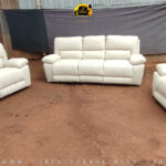 Image of a white recliner sofa set after it was re-upholstered by Forever Furnitures