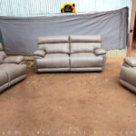 Image of a brown leather recliner sofa set after it was re-upholstered by Forever Furnitures